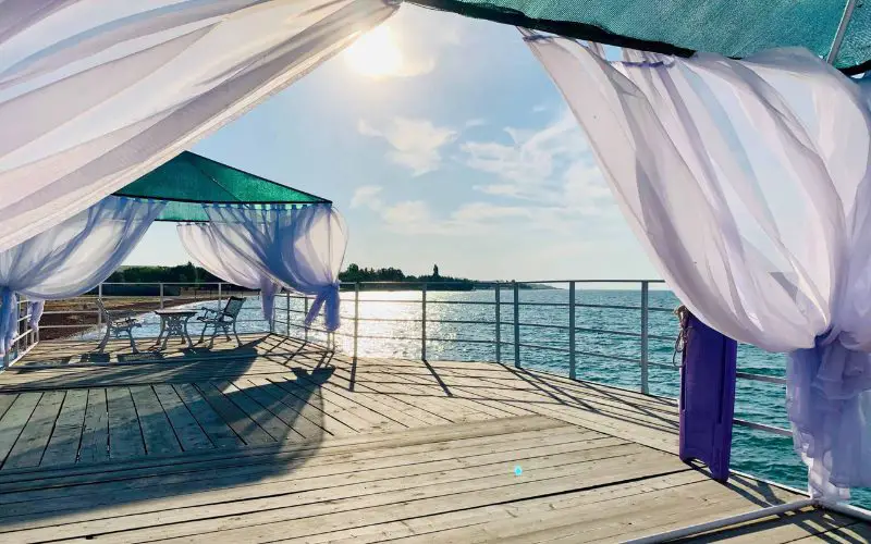 How To Keep Outdoor Curtains From Blowing In The Wind (8 Better Ways)