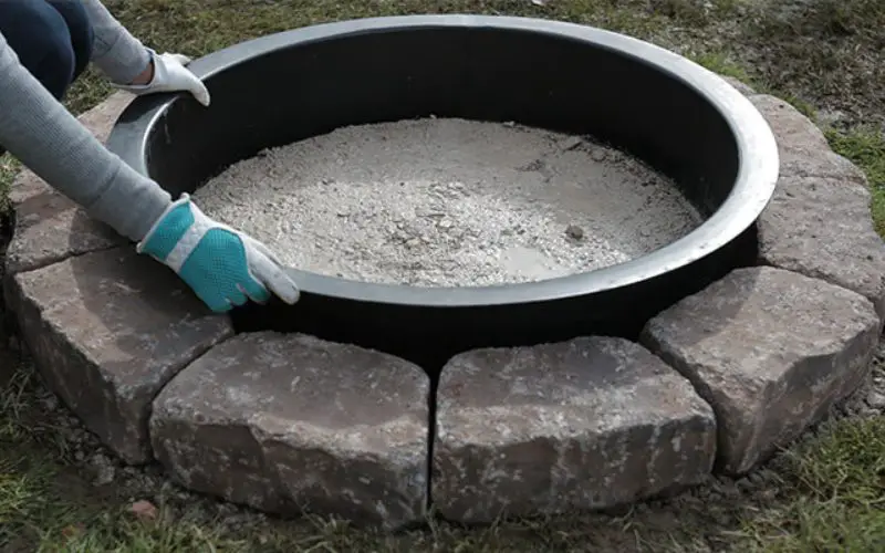 Should I Put Sand In My Metal Fire Pit
